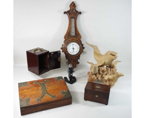 A 19th century walnut and brass bound writing slope, with a fitted interior, 26cm, together with a carved figure group of wha