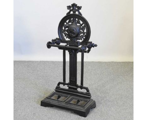 A Victorian style black painted metal stick stand