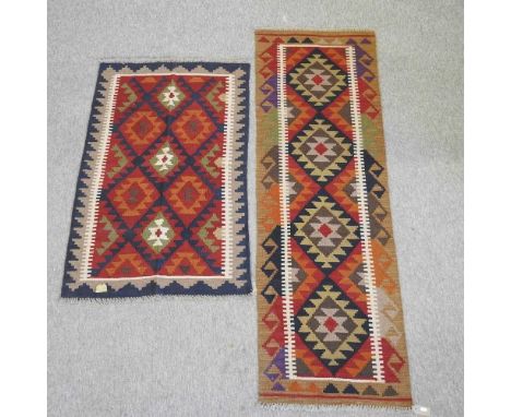 A kelim runner, 194 x 60cm, together with a kelim rug, 128 x 80cm (2)