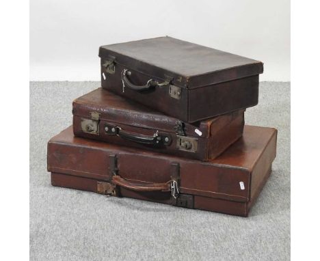 A vintage leather suitcase, 72cm, together with two others smaller (3)72 x 40 x 18h cm