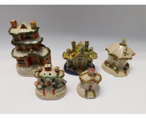 A collection of 19th Century Ceramic models in the form of various buildings , to include 3 story house in the form of a mone