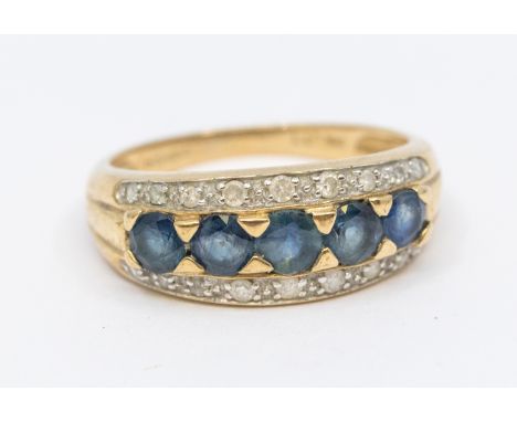 A sapphire and diamond five stone set 9ct gold ring, comprising five mixed cut round sapphires, within a diamond grain set bo