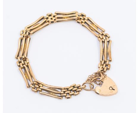 A 9ct gold gate bracelet, width approx 7mm, padlock clasp, length approx 19cm, weight approx 11.6gms    Further details:links