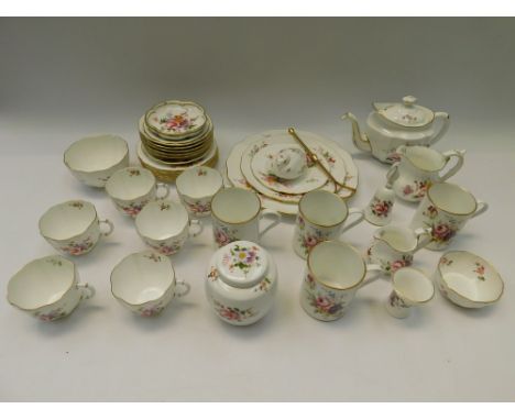 Royal Crown Derby: a six place setting of Posies pattern tea service comprising six trios, four mugs, teapot, sugar basin, mi