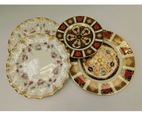 A Royal Crown Derby 1128 pattern 8 1/2" plate and a Royal Crown Derby 1128 pattern 6 1/2" plate both factory seconds together