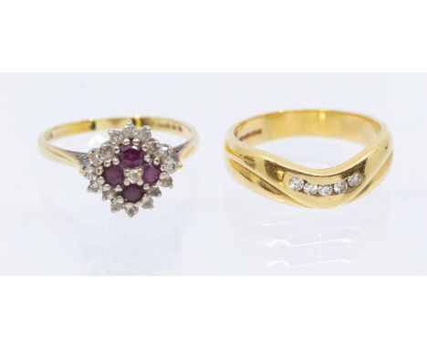 A ruby and diamond set 18ct gold cluster ring, set with four rubies within diamond border, width approx 9mm, size M, total gr