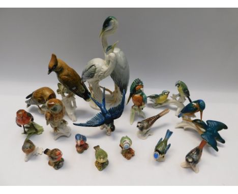 A collection of 16 bird figures to include 4 Royal Doulton bird figures, 5 Goebel bird figures, 7 Karl Ens bird figures  (1 E