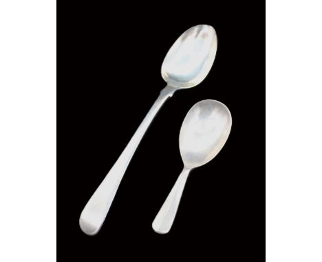 An Elizabeth II silver caddy spoon, hallmarked by Eugene Leclere, Sheffield, 1958, approx. 9.3cm long, along with a George II