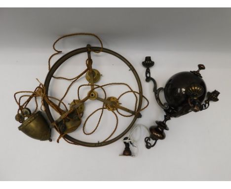 An early 20th Century brass and copper light/ceiling fitting with pully mechanism. some tarnishing and wear