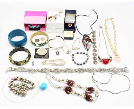 A collection of mixed costume jewellery to include; mainly necklaces, various beads or glass types; few bangles. Mostly late 