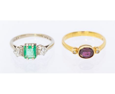 An emerald and diamond 9ct white gold three stone ring, platinum set with a square emerald approx 5mm, old cut diamonds set e