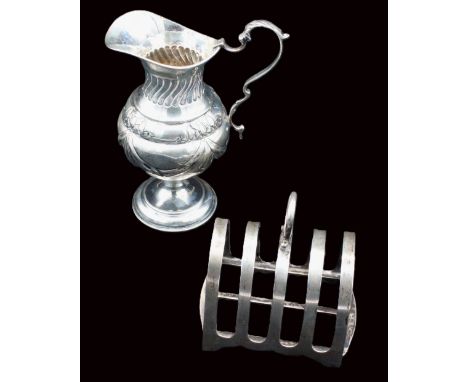 A George V silver toast rack, of four divisions and domed arched shape, hallmarked by S. Blanckensee & Sons Ltd, Birmingham, 