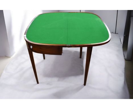 A mahogany George III card table with lift up lid to reveal green velvet playing surface on tapered legs.