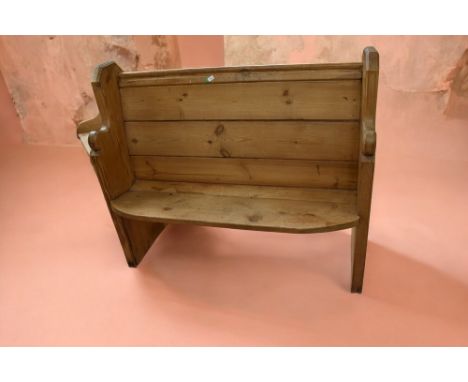 A late 19th Century small pine church pew, 114cm long with bow front seat along with a mid 19th Century pine commode with lif