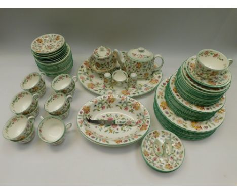 A Minton Haddon Hall dinner and tea service to include cups, saucers, large/small plates. teapot, sugar and cream, bowls inlc