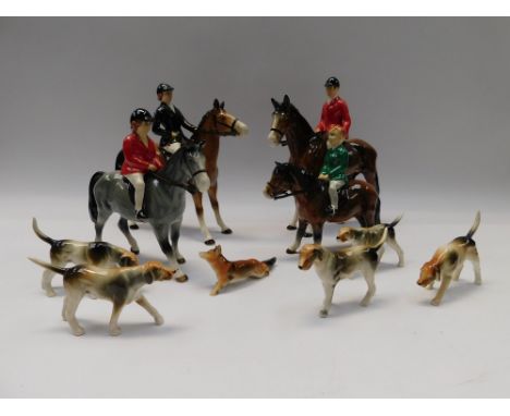 A collection of ceramic Horse and Rider models , 4 in total , together with hounds an a fox ,all in good condition with no ch