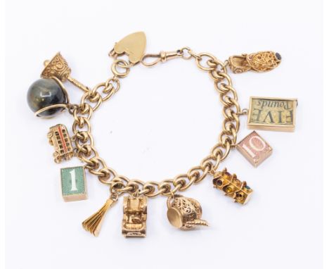 A 9ct gold fancy link charm bracelet, chain width approx 8mm, each link  marked, with swivel, bolt (a/f) and padlock clasp, l