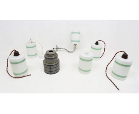 A collection of 20th century Art Deco style glass light shades to include; five matching cylindrical shaped white with green 
