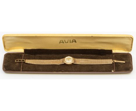 A ladies vintage Avia 9ct gold dress watch, comprising a round signed silvered dial with applied quarter gilt number and bato