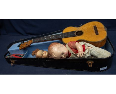 Two mid 20th Century child's dolls, 1930s child's shoes. Adderley ware tall water jug, brass top table and a cased ukulele.