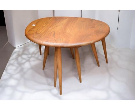 1960s Ercol nest of pebble tables in light oak.