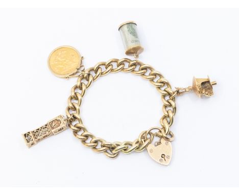 A 9ct gold charm bracelet, comprising a solid curb link bracelet width approx 9mm, with padlock clasp and safety chain, lengt