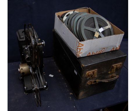 A 1930s/40s Specton Ltd home cinema projector with carry case and film reels in Pathe.