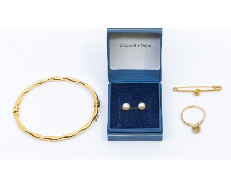 A collection of gold items including gold nugget bar brooch and similar ring, size N, unmarked possibly minimum of 18ct, weig