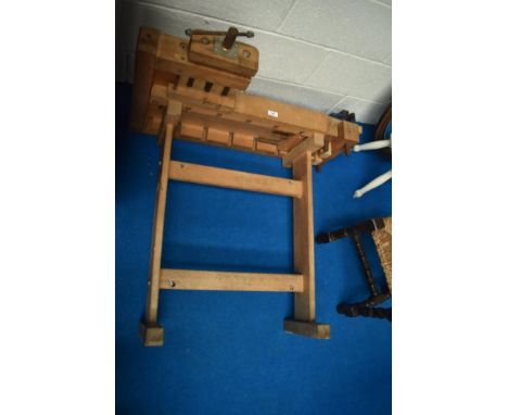 A traditional work bench with vice