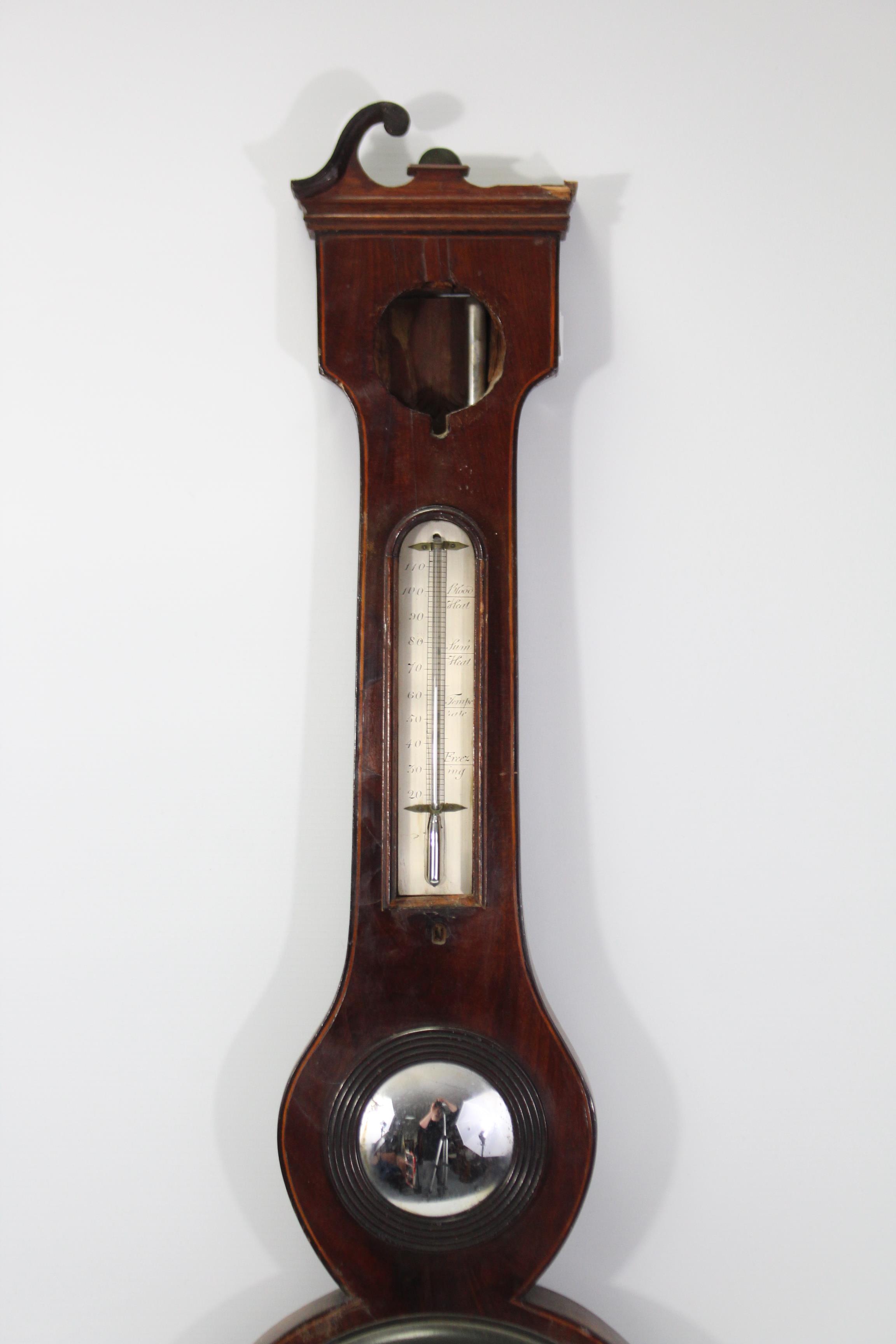 A 19th century inlaid mahogany banjo barometer with hygrometer