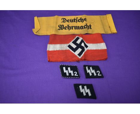 Two WW2 German SS2 Collar Patches both on black felt, one with silver wire and black twist cord piping and both with RZM pape