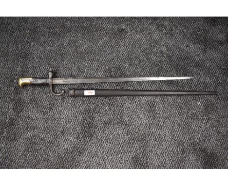 A French Epee Bayonet model 1874 for use with the Gras Rifle, Chassepot conversion, blade dated 1874 with metal scabbard blad