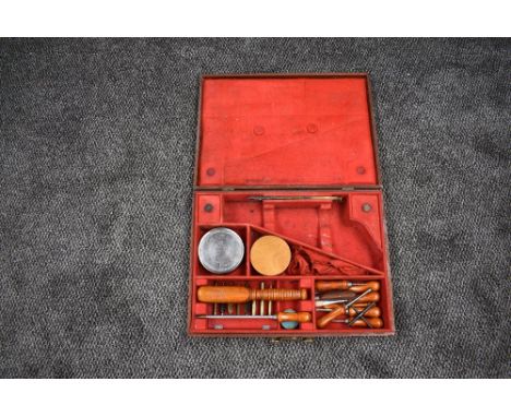 A vintage wooden fitted Percussion Pistol Case, missing pistol, with accessories including Gun Cleaning Tools, similar Tool, 
