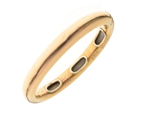 Victorian gold hinged bangle, unmarked, of plain round section, to the inner bangle, hidden when worn are five lockets, one v