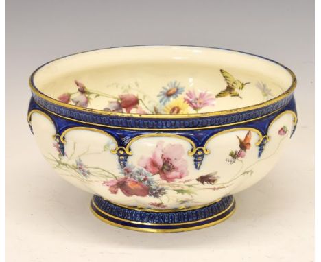 Royal Worcester bowl, having painted decoration depicting a bee and butterfly amongst foliage, the moulded blue glazed rim an