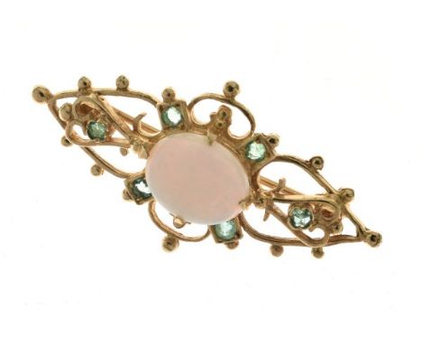 Opal and emerald brooch, in the Victorian style, 3.9cm long, 4g gross   Condition: The pale oval opal 9mm x 11mm approx, unma