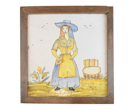 Late 19th/early 20th Century French faience tile plaque, typically polychrome decorated with a country girl in a landscape, 2