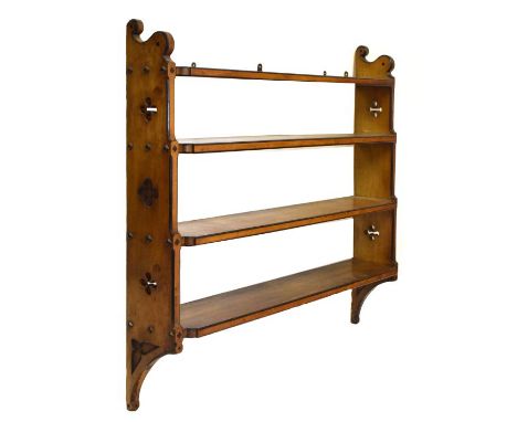 Set of late Victorian Gothic Revival ash and ebonised open wall shelves, the four shelves with re-entrant corners and ebonise