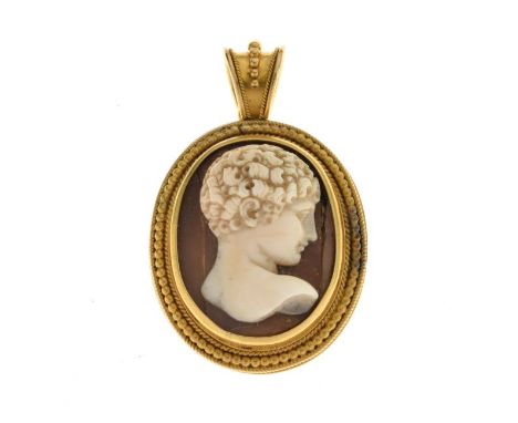 Victorian shell cameo pendant, the unmarked locket back mount beaded in the Etruscan style, 2.7cm excluding the bale   Condit