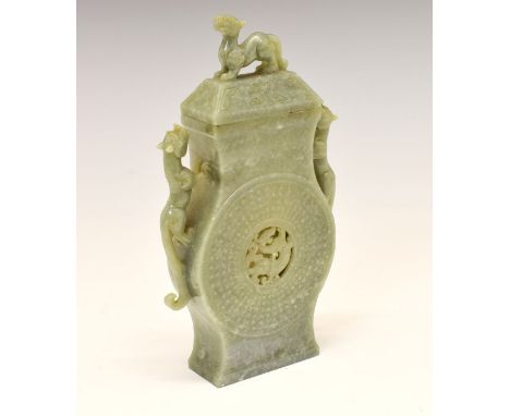 Chinese green mottled jade baluster shaped jar and cover, the handles and knop formed as a wild cat, the body with pierced ro