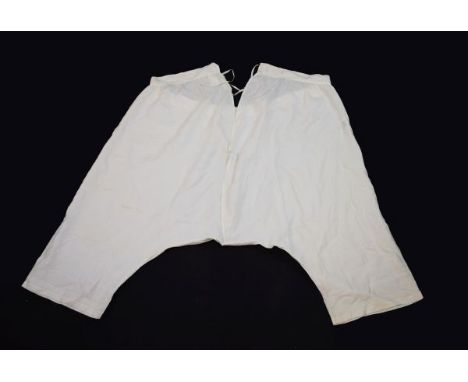 Royal Memorabilia, - A rare pair of Queen Victoria's 'split drawers' or bloomers, in ivory silk with finely embroidered crown