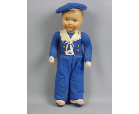 A German 'Sailor Boy' doll, cloth bodied with papier mache head and painted detail, part integrated outfit with neck tie and 