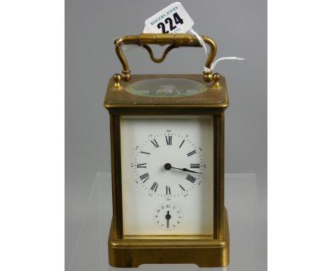 A late 19th Century brass carriage clock with presentation inscription in recognition of services as a stationmaster at Degan