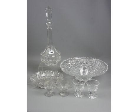 A heavy cut glass fruit bowl, a similarly cut tall glass decanter and stopper, two Edwardian custard cups and three further p