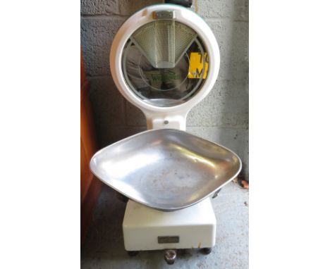 A set of Weighwell commercial shop scales, white enamelled frame with large white metal weighing pan, 74cm high
