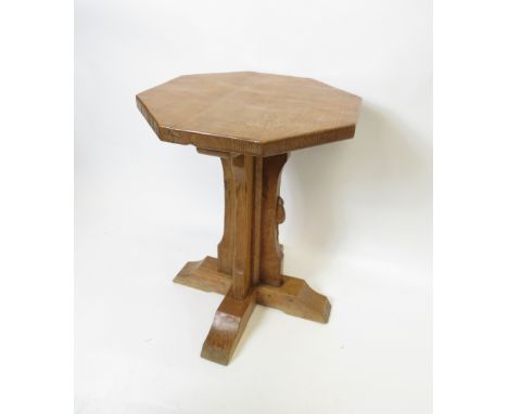 An oak octagonal coffee table, carved with a single mouse, possibly by Robert 'Mouseman' Thompson, 58.7cm high, 47.7cm wide