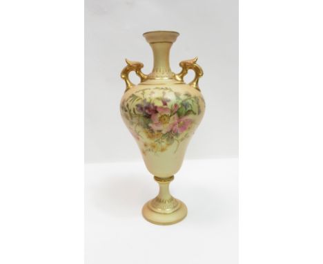 A Royal Worcester blush ivory two handled vase, model number 2426, 23.5cm high