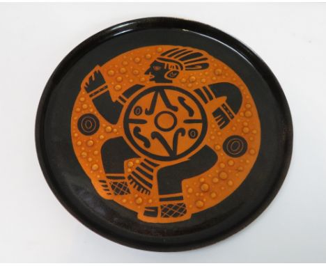 Mid century enamel on copperplate plate, in an aztec design by Miguel Pinead, 30.5cm