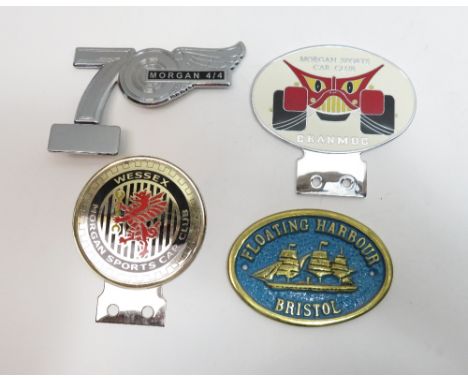 A Morgan Sports Car Club enamelled white metal bumper badge, two other Morgan club badges and Floating Harbour plaque