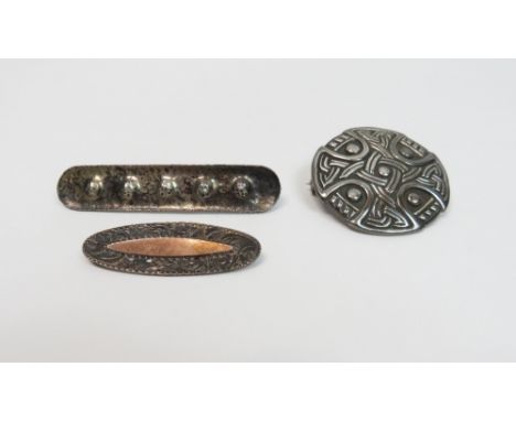 A silver brooch, Chester hallmark; a Celtic style brooch; and a German brooch, stamped '800'